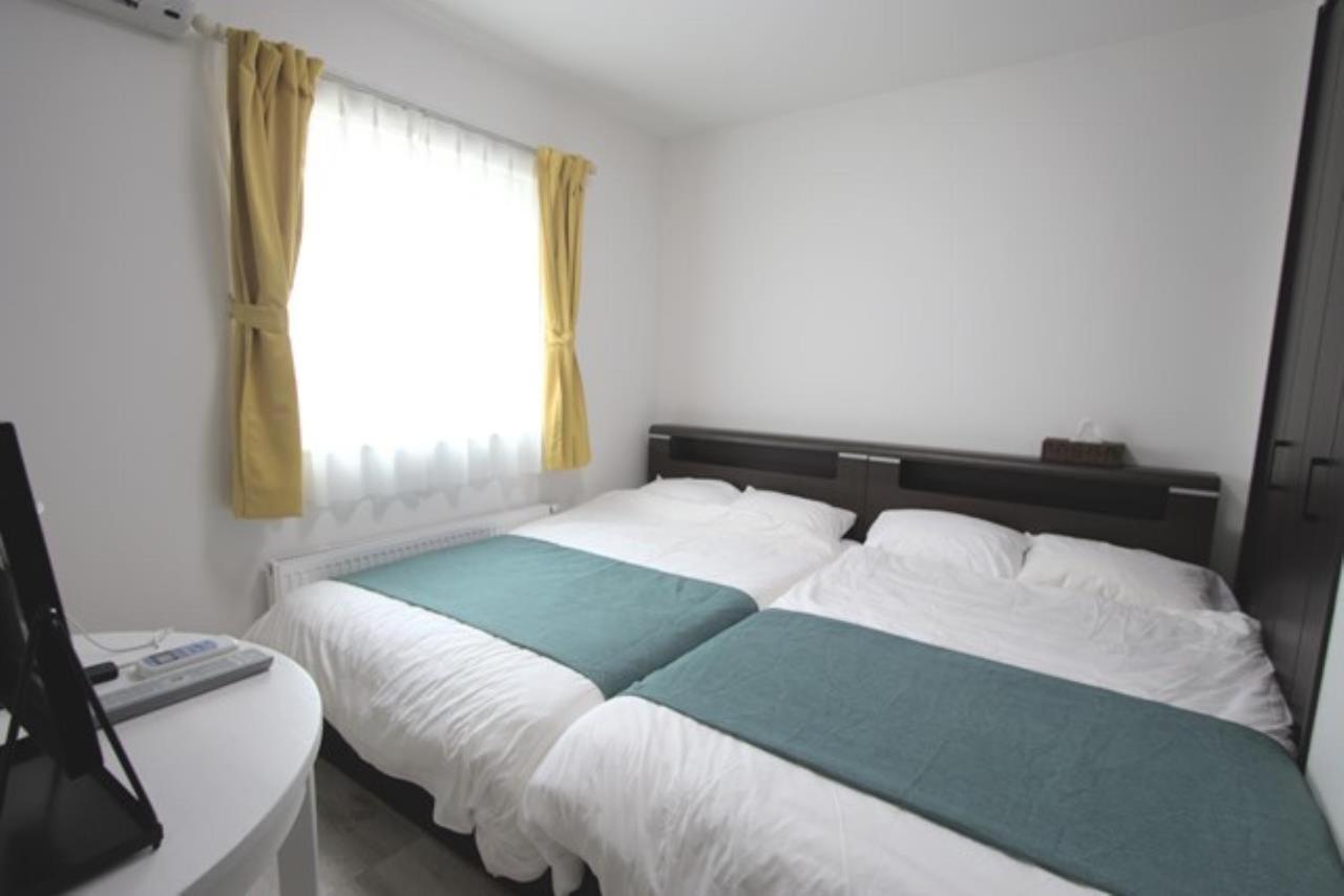 Teine White House Villa Sapporo Bagian luar foto