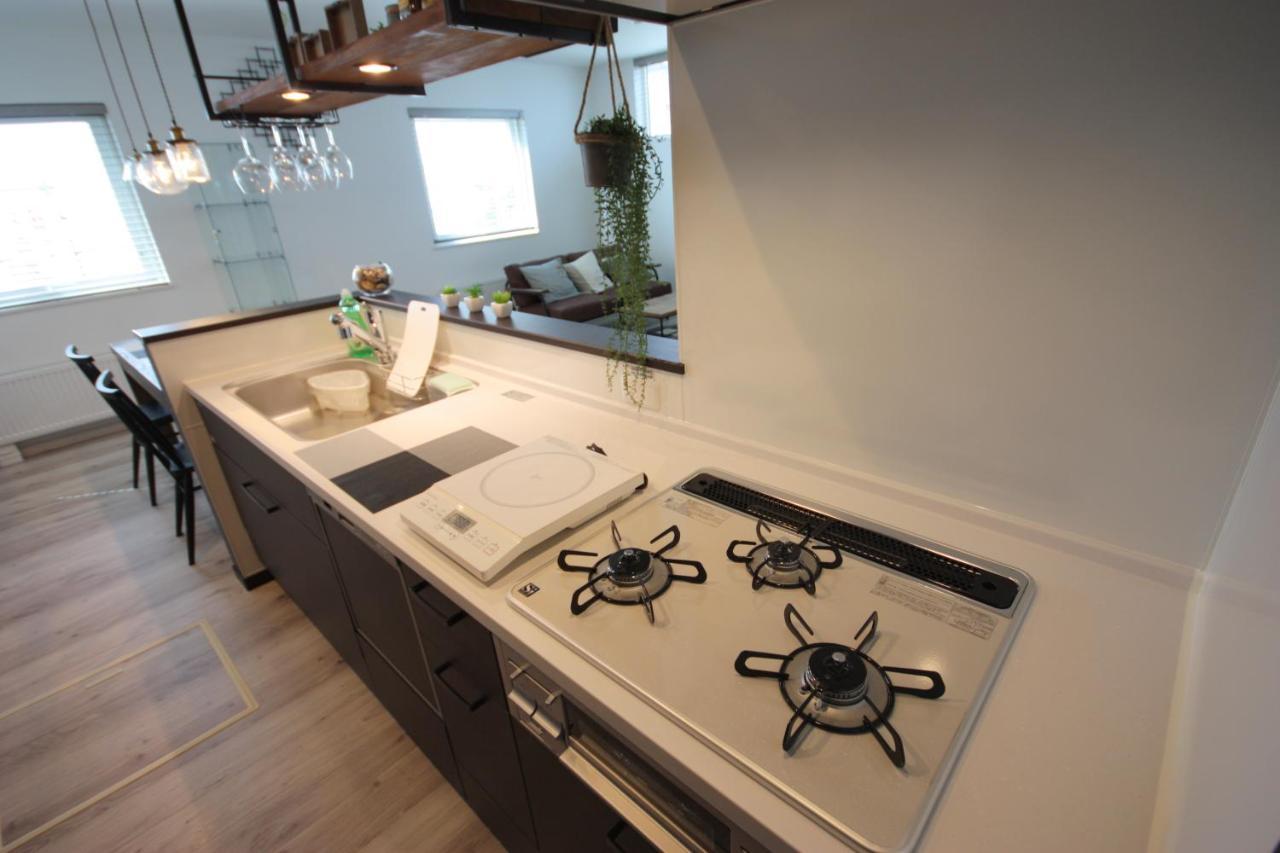 Teine White House Villa Sapporo Bagian luar foto